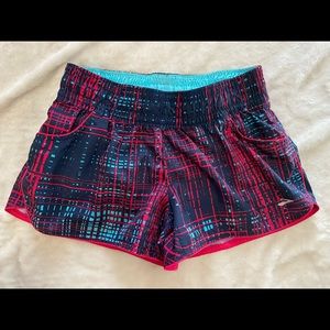 {Brooks} Fuchsia and Blue Running Shorts